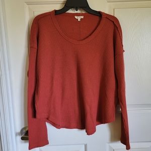Waffle pattern, long sleeve, round hem, top.  Size Medium